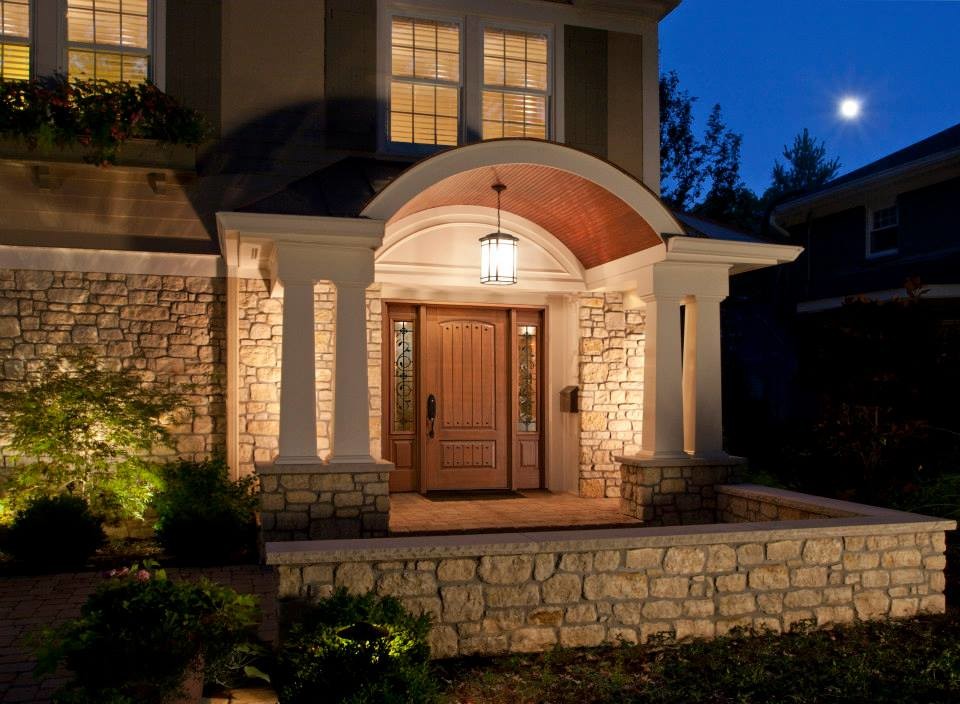 Photo of a large traditional front door in Raleigh with a single front door and a medium wood front door.