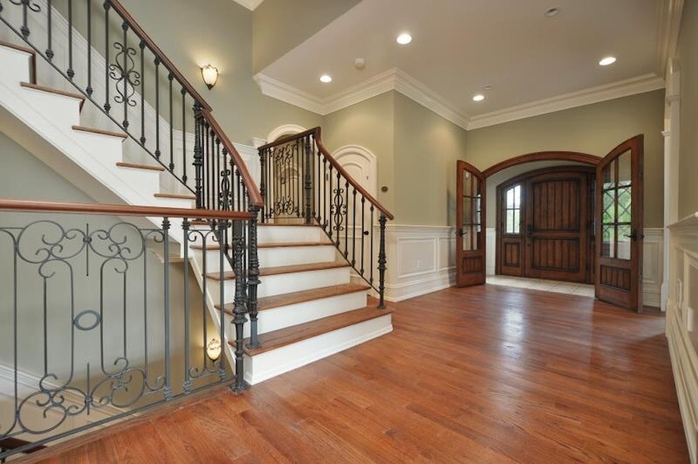 Inspiration for a medium sized traditional foyer in Baltimore with a single front door and a medium wood front door.