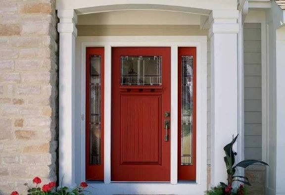 Immagine di una porta d'ingresso chic di medie dimensioni con pareti beige, una porta singola e una porta rossa