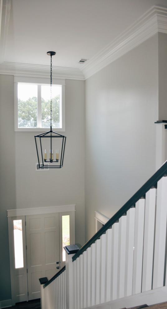 Cottage light wood floor and gray floor single front door photo in Other with gray walls and a white front door