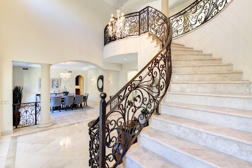 This is an example of a medium sized mediterranean staircase in Los Angeles.
