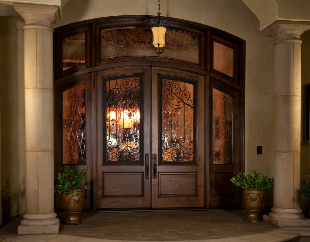 Inspiration for a huge timeless entryway remodel in San Francisco with beige walls and a medium wood front door