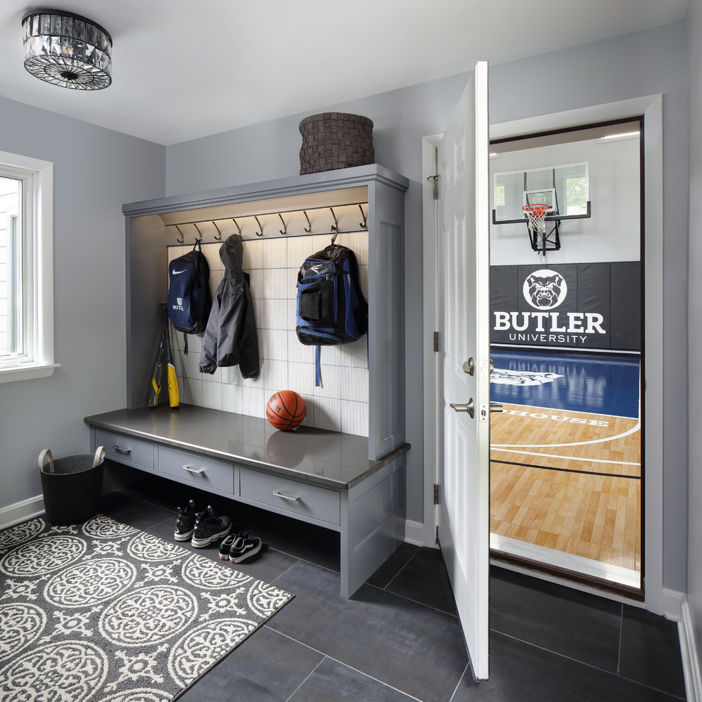 Small transitional porcelain tile and gray floor mudroom photo in Milwaukee with gray walls