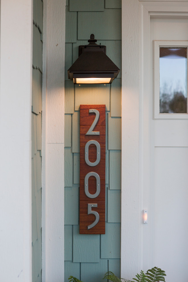 Inspiration for a large craftsman entryway remodel in Austin with a red front door