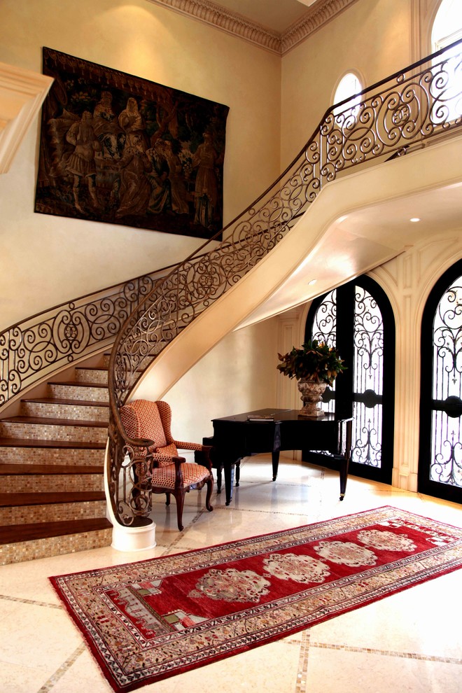 Expansive mediterranean foyer in Dallas with beige walls, marble flooring, a double front door and beige floors.