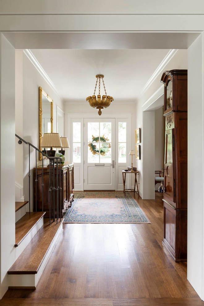 Design ideas for a traditional entrance in Dallas with feature lighting.