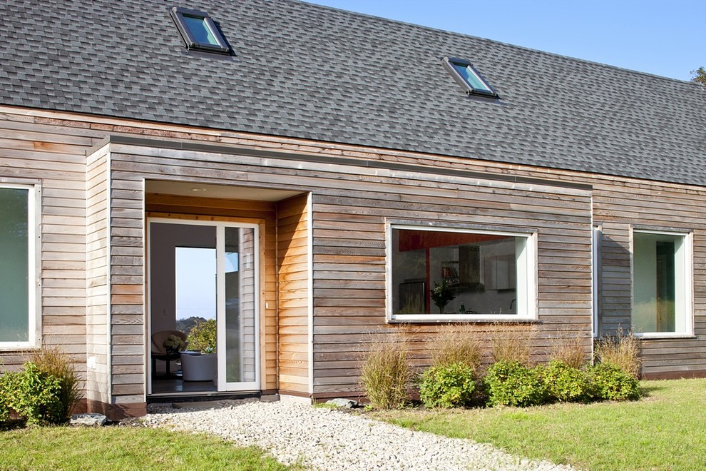Example of a cottage single front door design in Providence