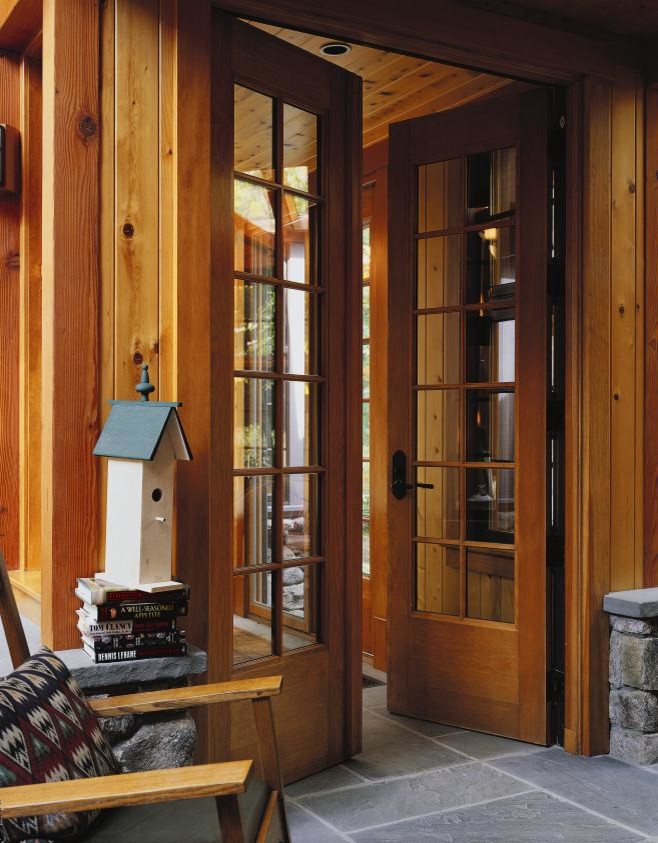 Pella® Architect Series® hinged patio doors open up to beautiful