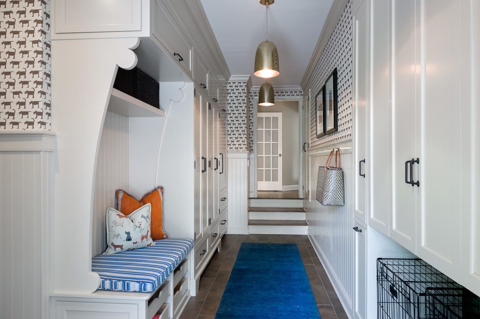 Entryway - large transitional porcelain tile entryway idea in New York with brown walls and a black front door