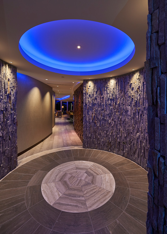 Inspiration for a large contemporary marble floor foyer remodel in Other