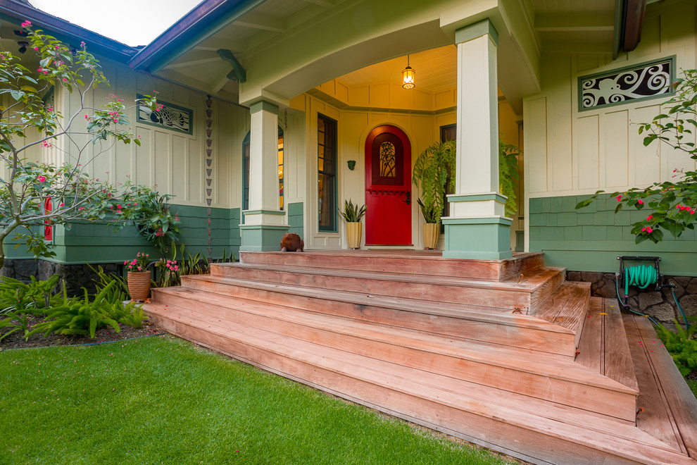 Photo of a medium sized traditional front door in Hawaii with a single front door and a red front door.