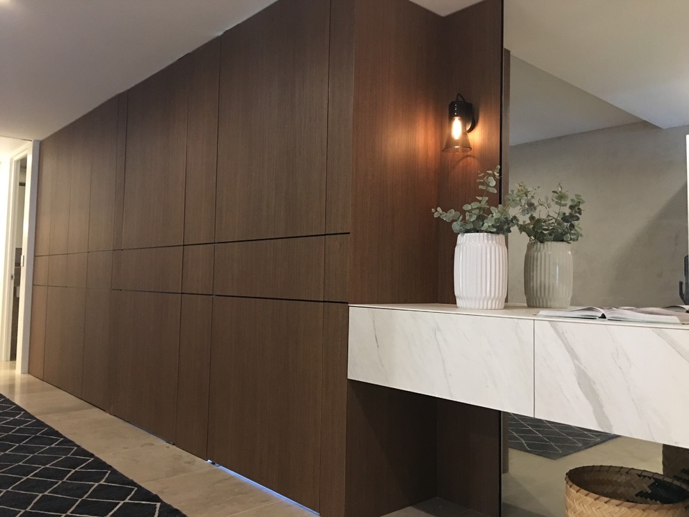 Example of a large minimalist entryway design in Sydney