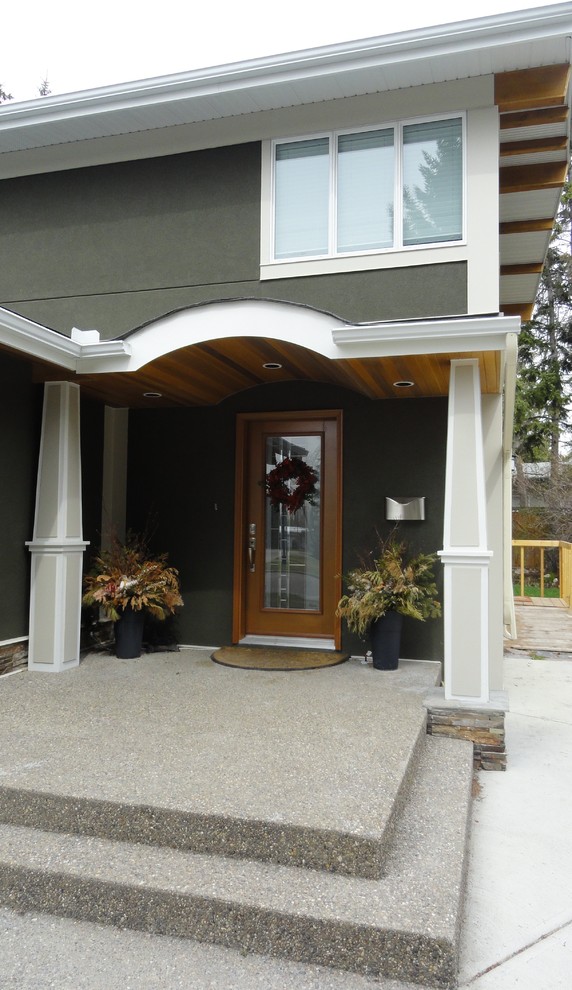 Medium sized traditional front door in Calgary with a single front door and a medium wood front door.