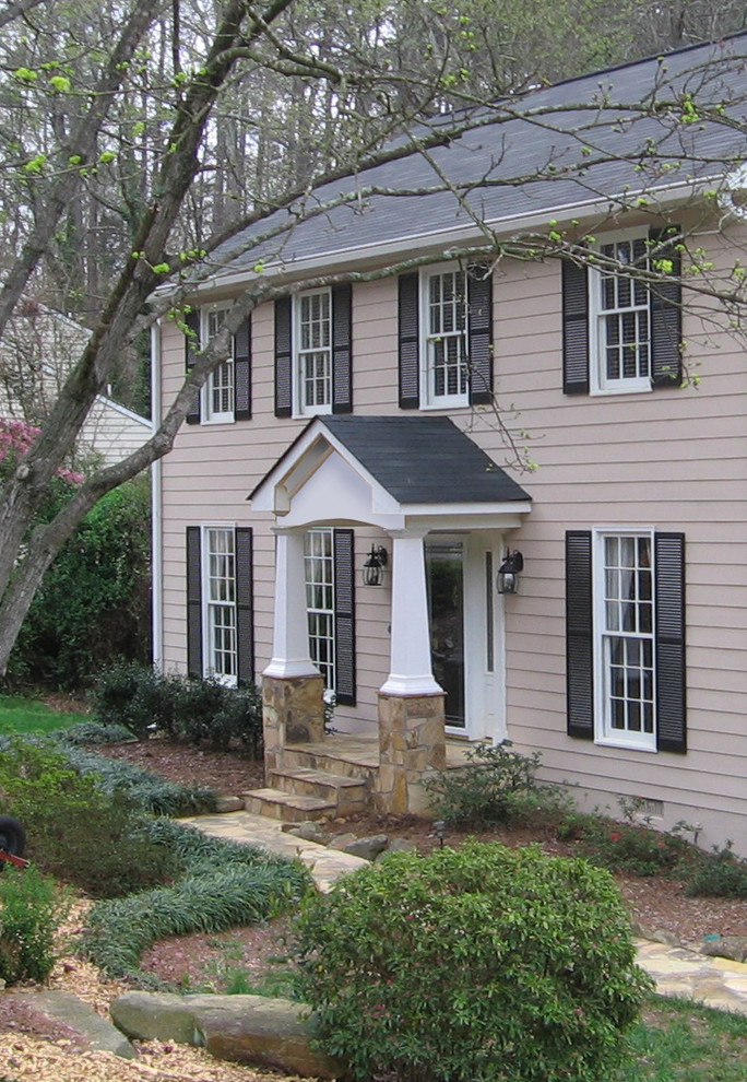 This is an example of a medium sized traditional front door in Atlanta with a single front door and a black front door.