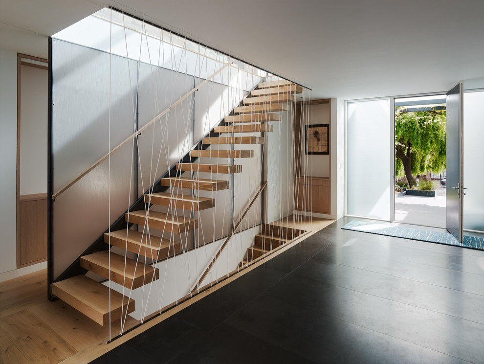 This is an example of a large contemporary staircase in San Francisco.