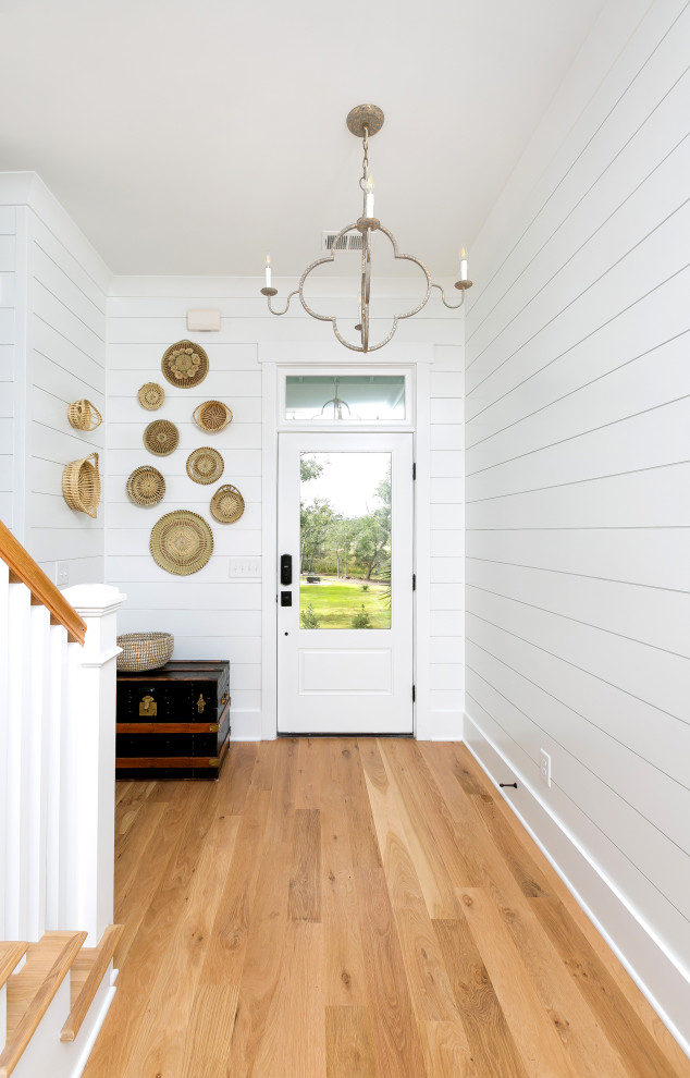 Example of a beach style entryway design in Charleston
