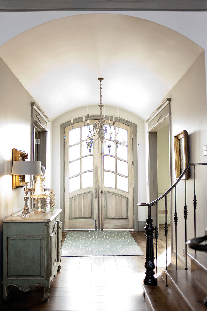 Example of a french country dark wood floor double front door design in Salt Lake City