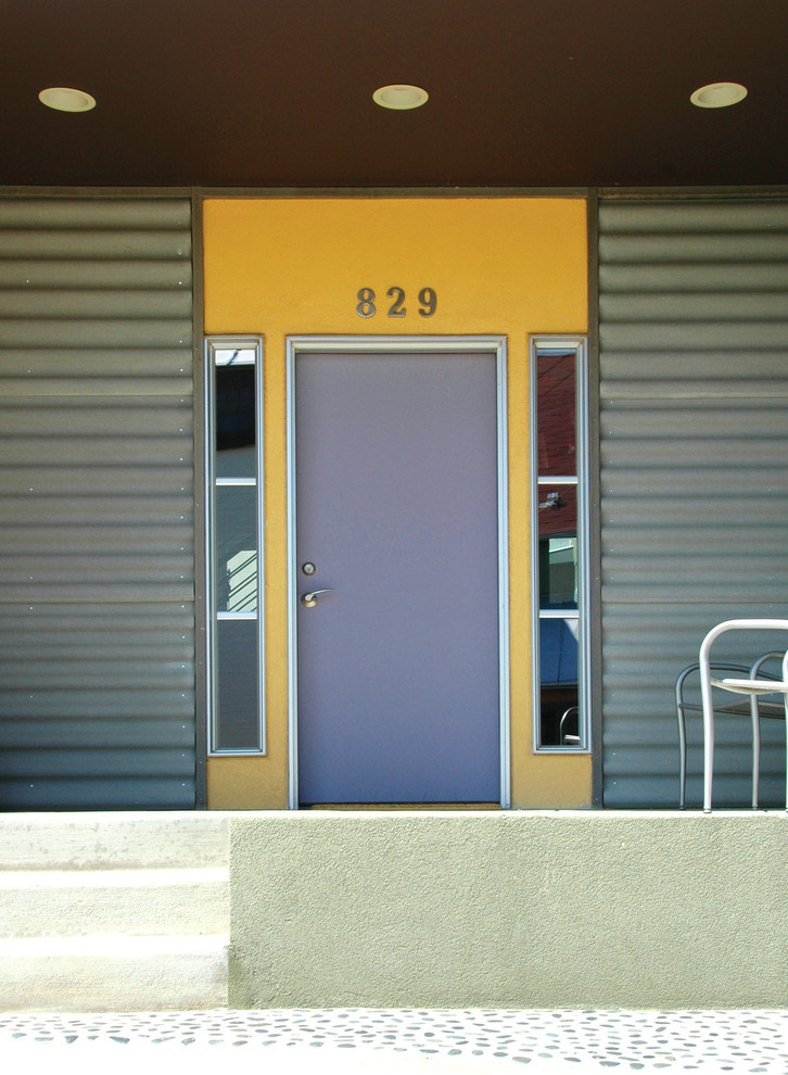 Inspiration for a modern front door in Denver with a single front door and a grey front door.