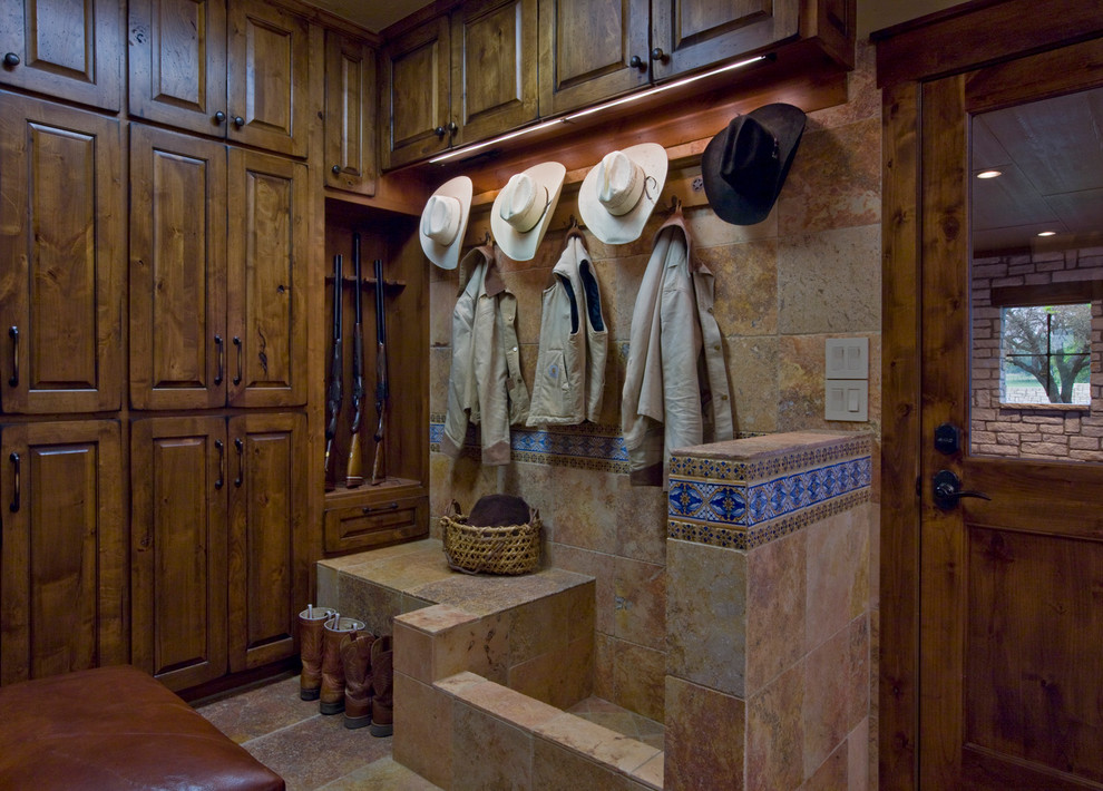 Inspiration for a rustic mudroom remodel in Austin