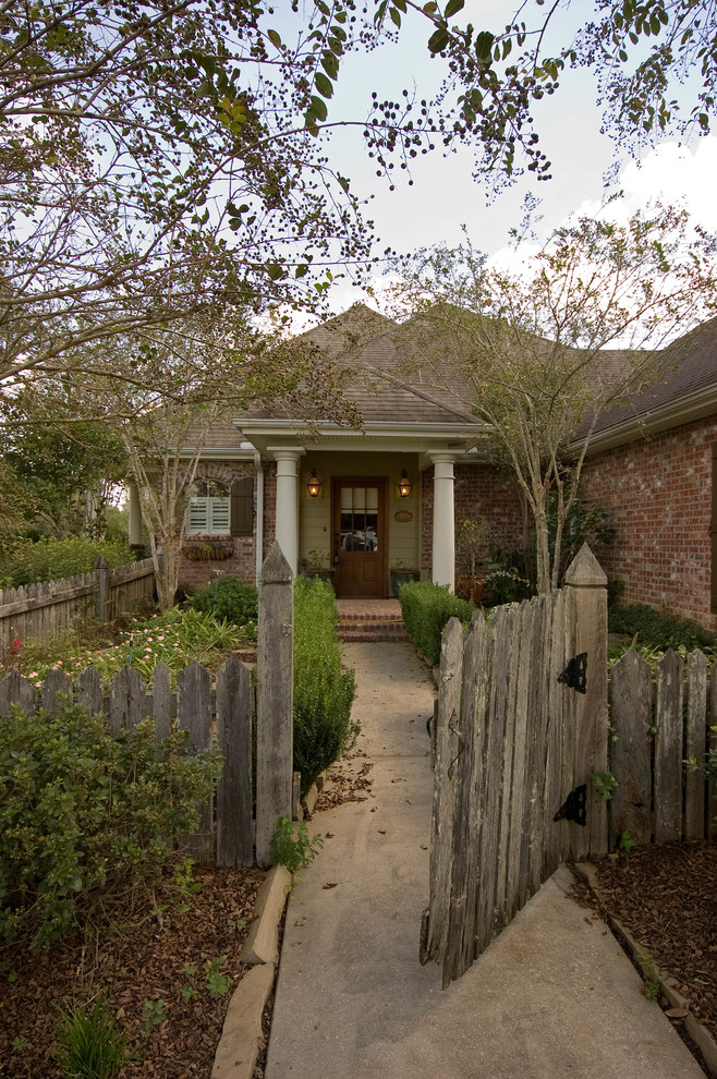 This is an example of a classic porch in New Orleans with a single front door.