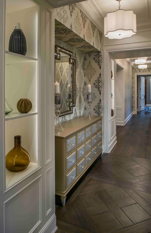 Inspiration for a large timeless dark wood floor entry hall remodel in Grand Rapids with multicolored walls