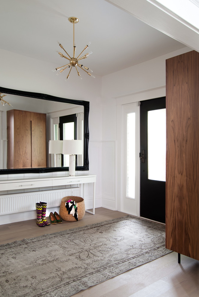 Transitional entry hall photo in Toronto