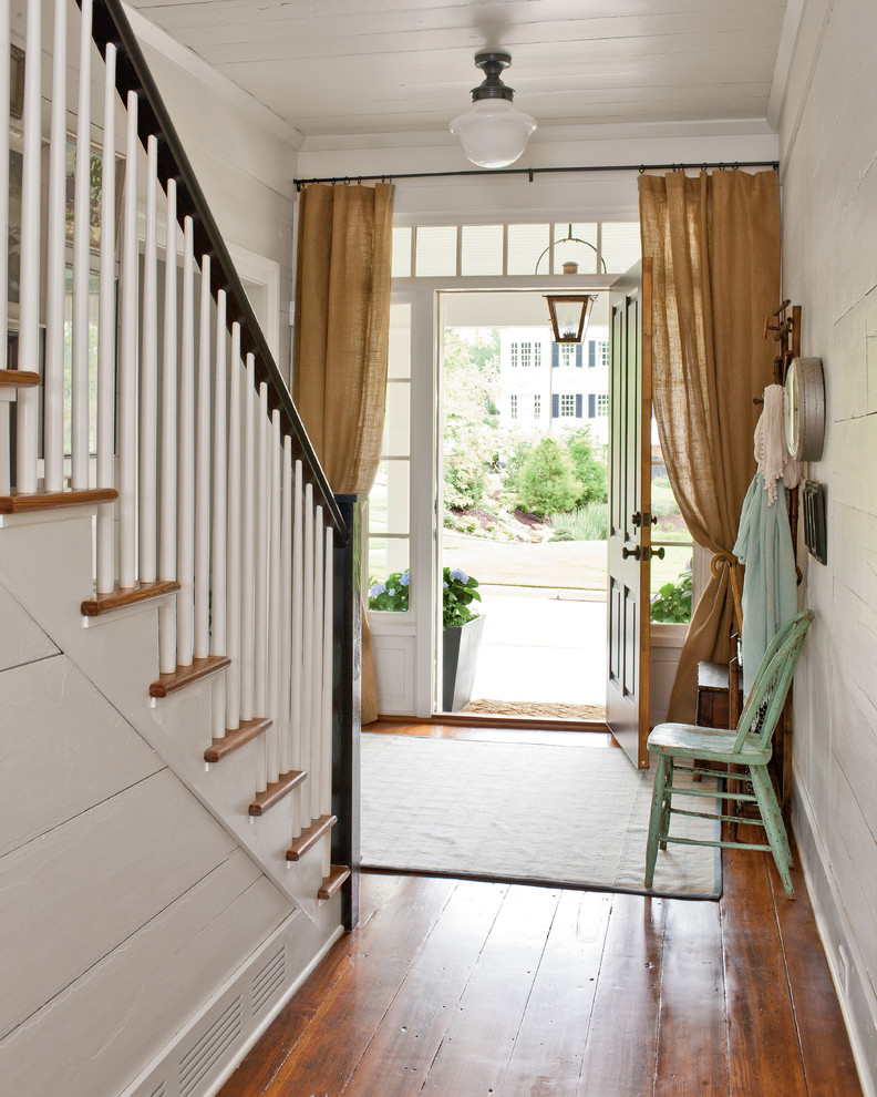 Entry hall - cottage entry hall idea in Atlanta with white walls