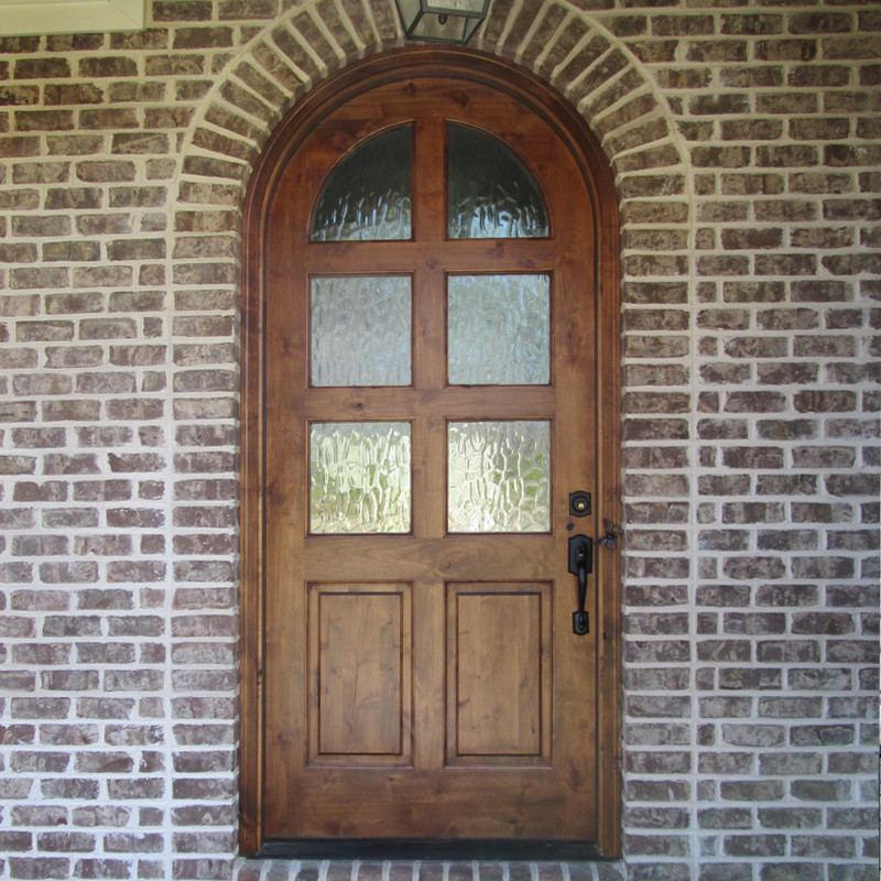 Ispirazione per una porta d'ingresso stile rurale con una porta singola