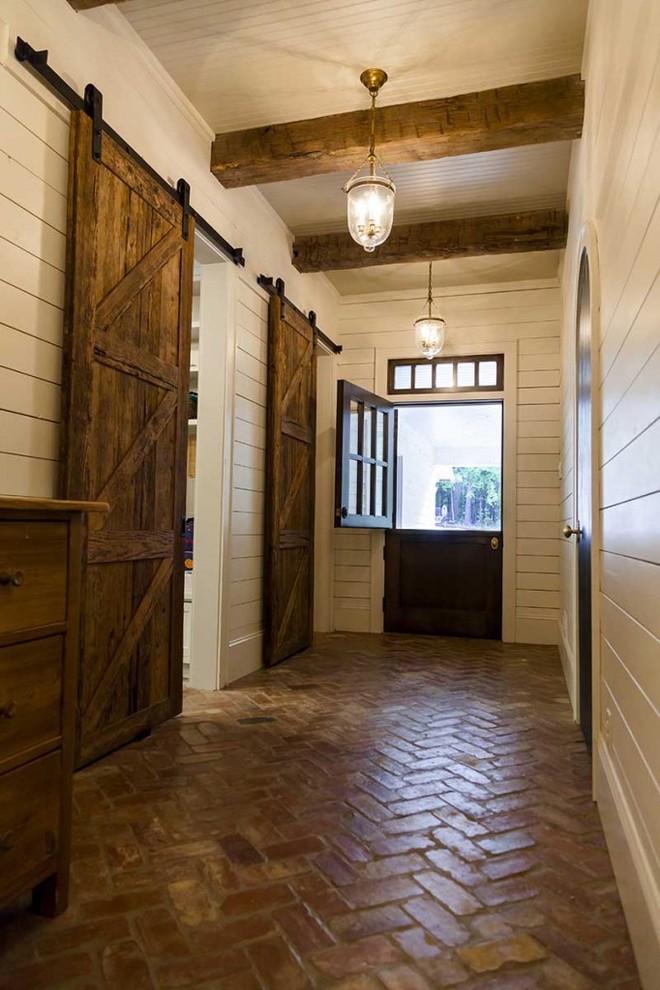 Dutch front door - country brick floor dutch front door idea in Birmingham
