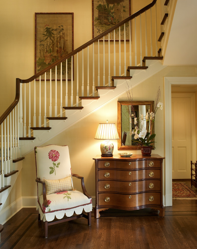 Inspiration for a large dark wood floor foyer remodel in Jacksonville with beige walls