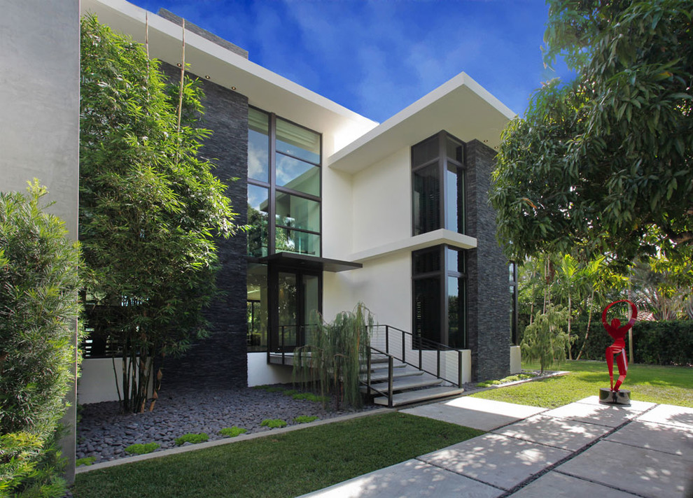 Inspiration for an expansive contemporary front door in Miami.