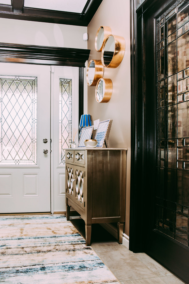 Medium sized eclectic foyer in Calgary with beige walls, porcelain flooring, a single front door, a white front door and beige floors.