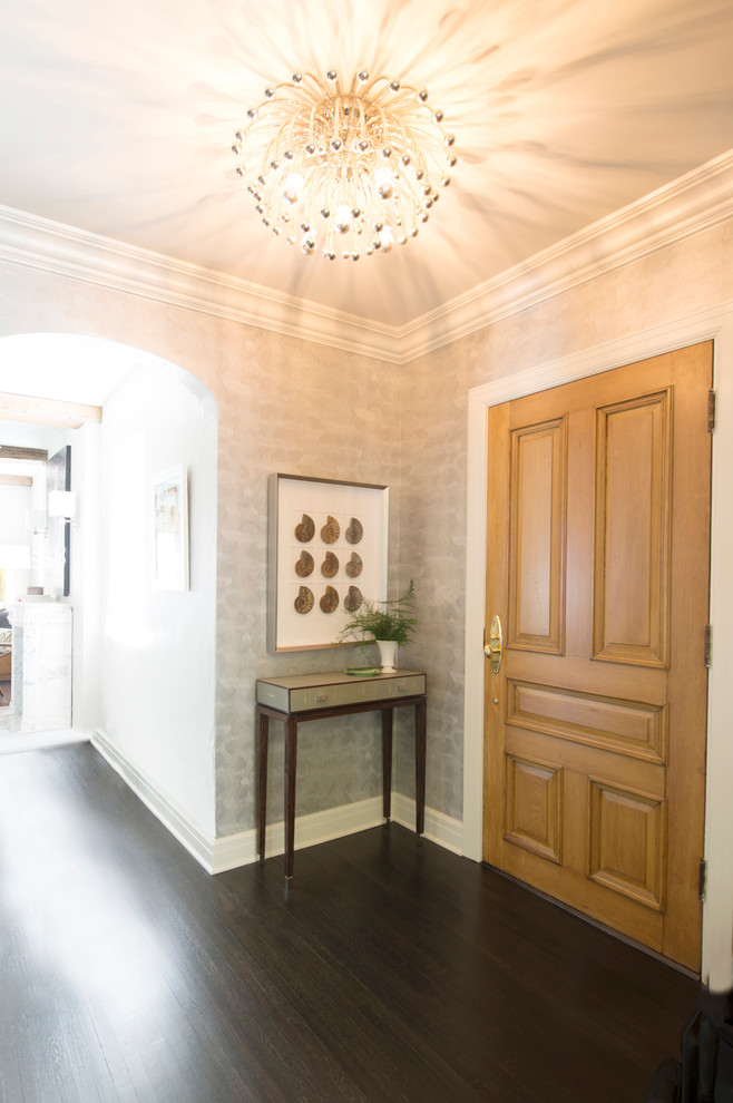 Example of a mid-sized classic dark wood floor foyer design in Other with gray walls