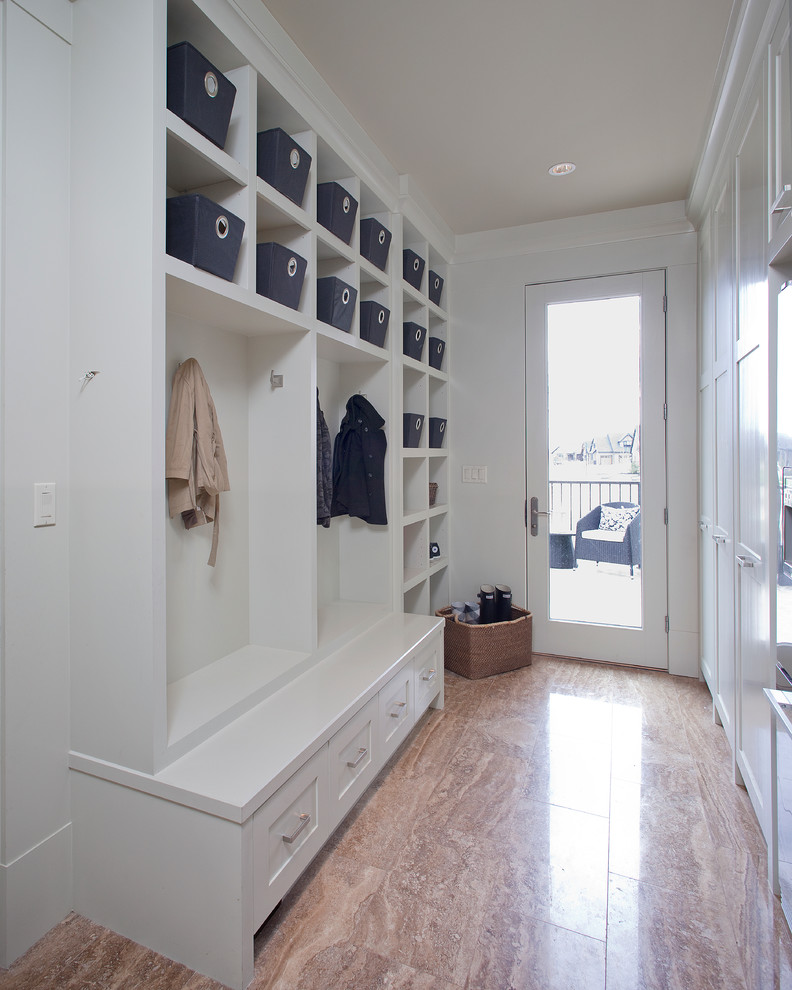 Photo of a traditional boot room in Calgary with white walls.