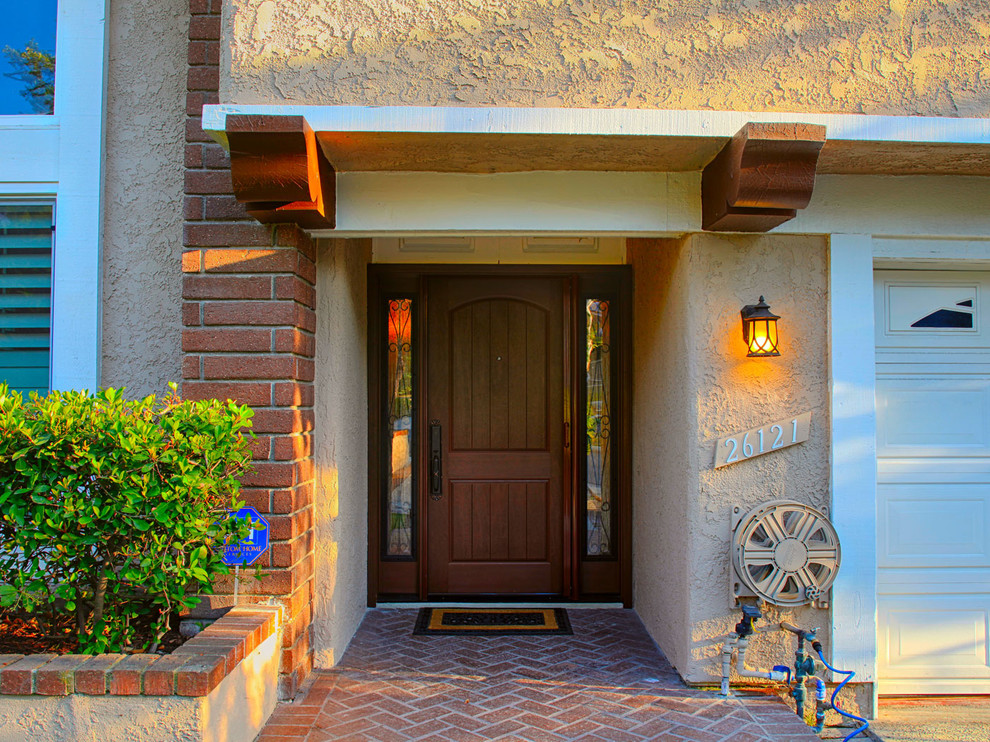Design ideas for a medium sized rustic front door in Orange County with beige walls, a single front door and a medium wood front door.