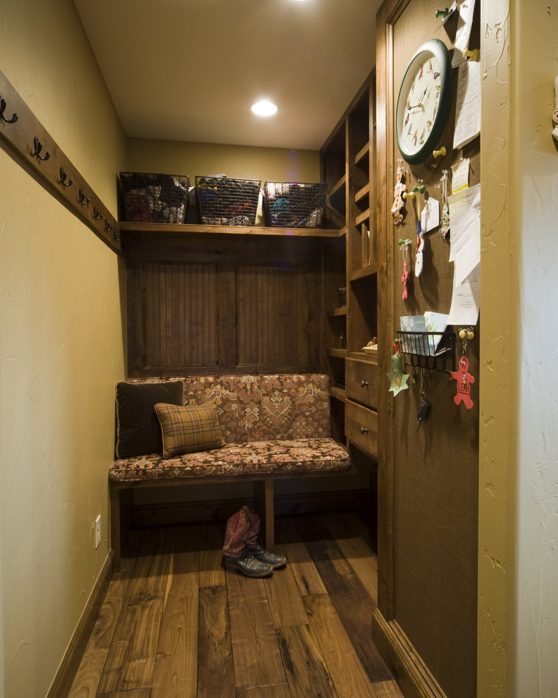 Inspiration for a small classic boot room in Denver with dark hardwood flooring.
