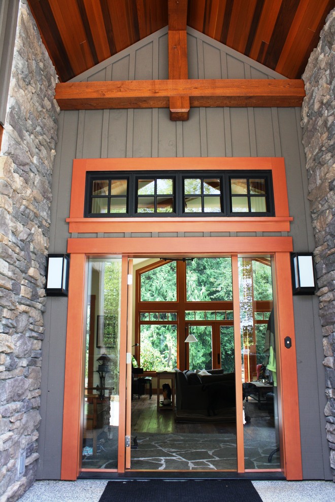 Mountain style entryway photo in Vancouver