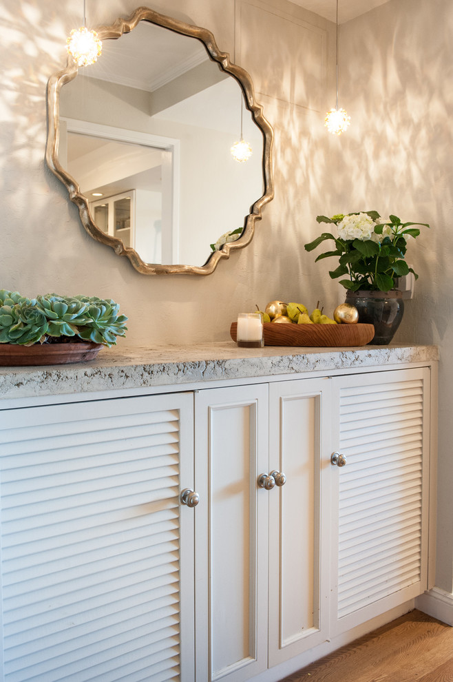 Small transitional medium tone wood floor and gray floor foyer photo in San Francisco with gray walls