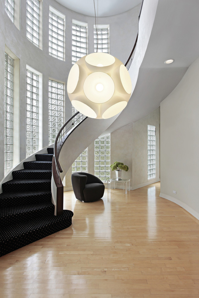 Photo of a large contemporary hallway in Miami with white walls and ceramic flooring.