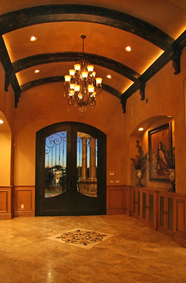 Tuscan entryway photo in Sacramento