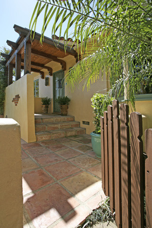 Tuscan entryway photo in Los Angeles