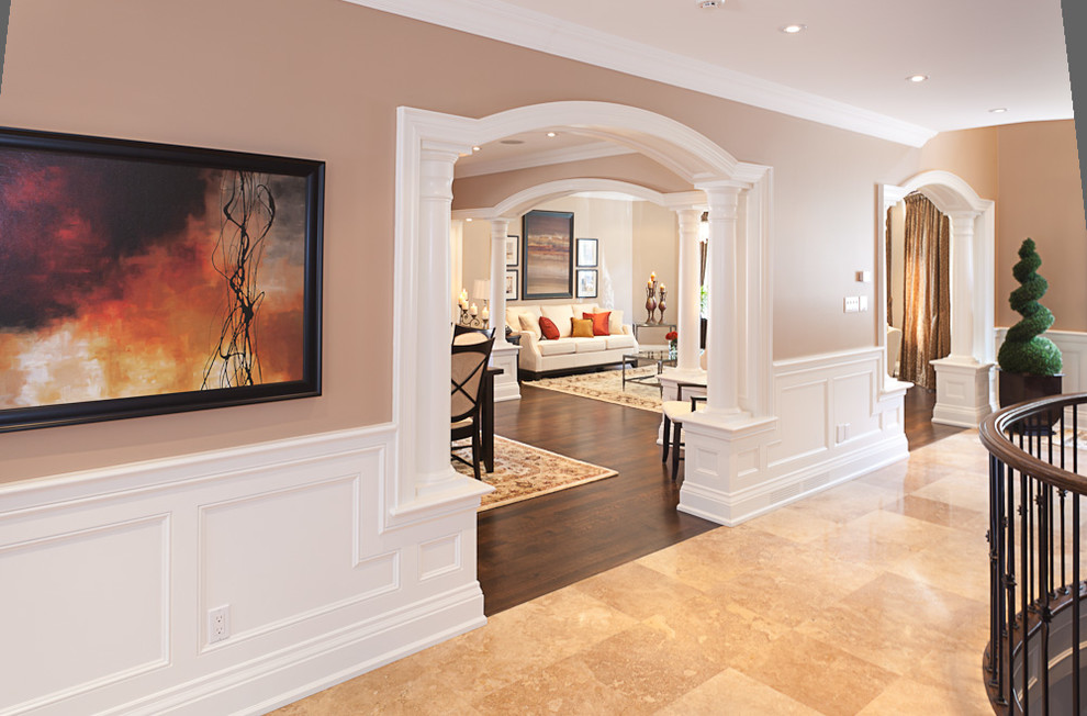 Entry hall - mid-sized contemporary entry hall idea in Toronto with beige walls