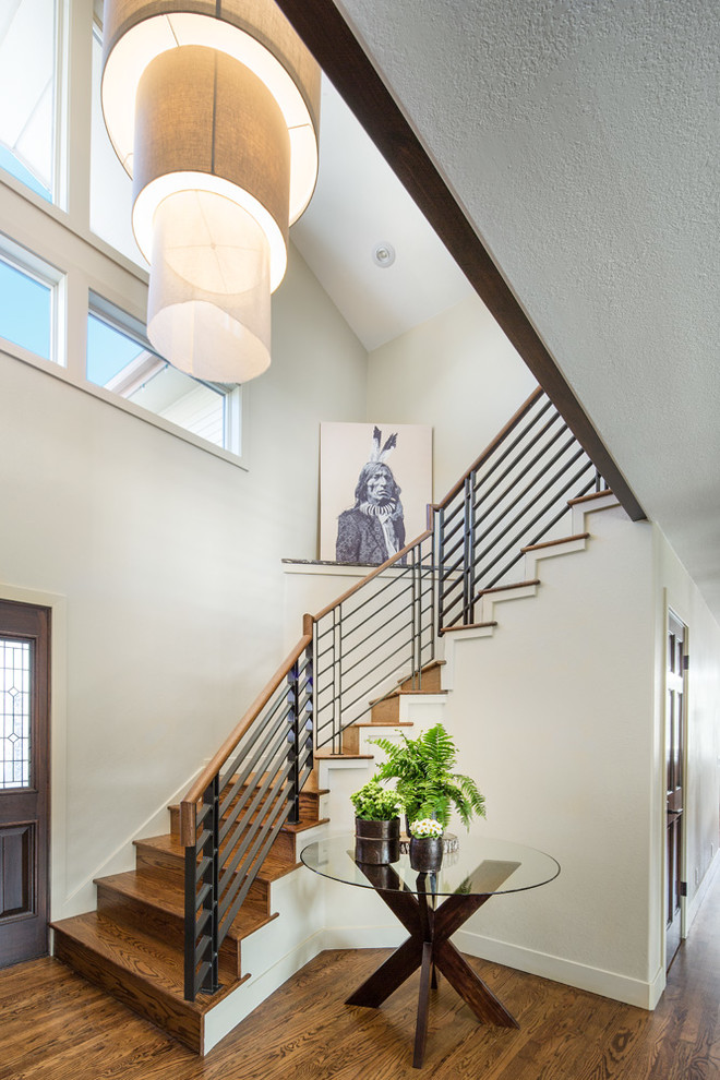 Inspiration for a medium sized contemporary foyer in Salt Lake City with beige walls, medium hardwood flooring, a single front door and a dark wood front door.