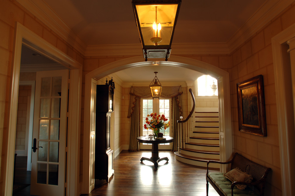 Photo of a medium sized classic foyer in Other with beige walls, medium hardwood flooring, a double front door and a white front door.