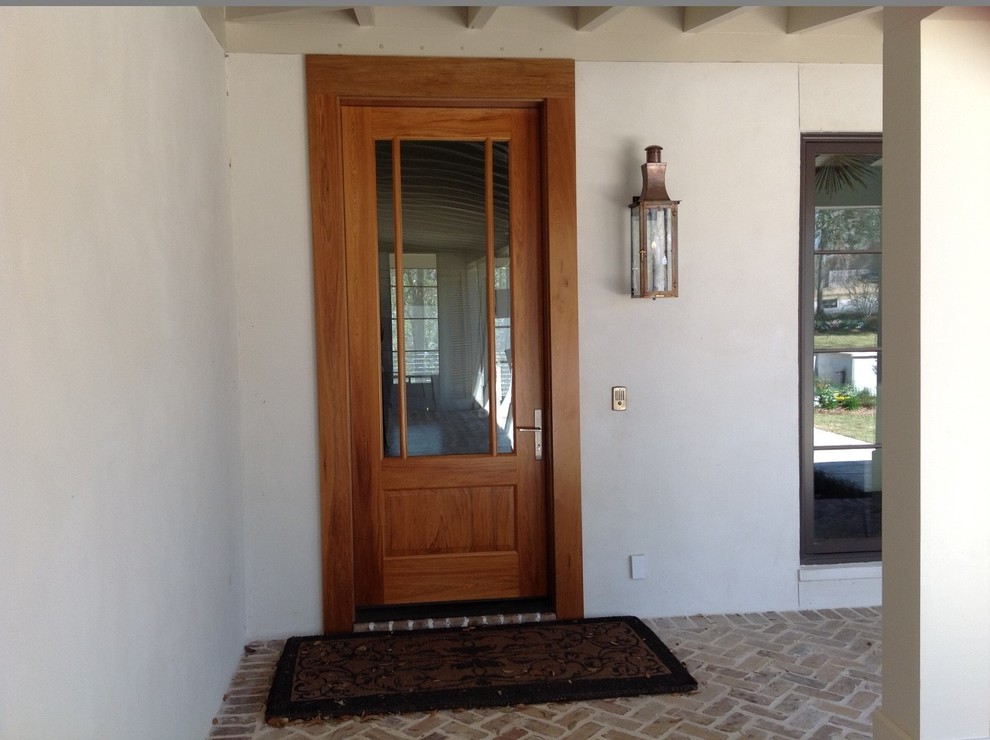 Idées déco pour une grande porte d'entrée contemporaine avec une porte simple et une porte en verre.