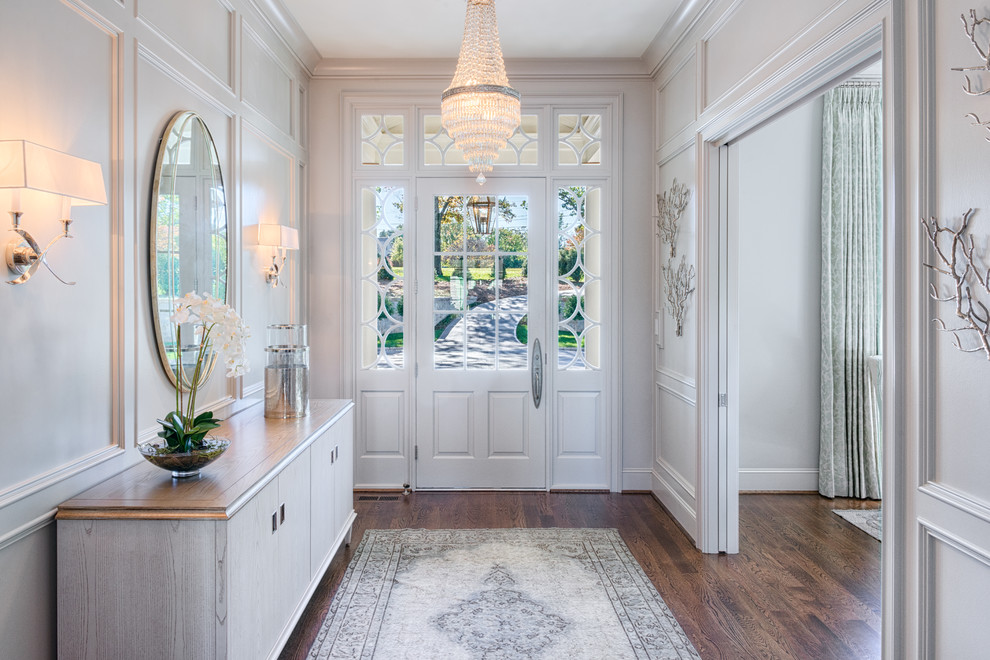 Large traditional entrance in Other with grey walls, dark hardwood flooring and a single front door.