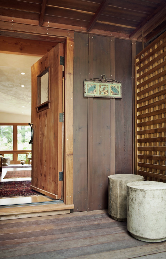 Inspiration for a rustic entrance in San Francisco with a single front door and a medium wood front door.