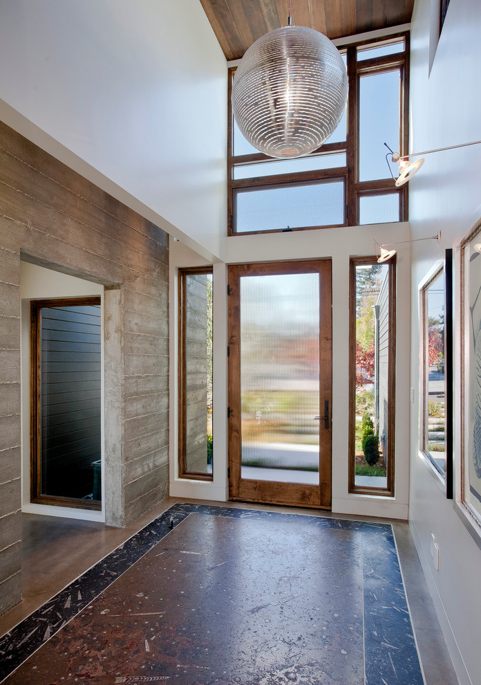 Inspiration for a contemporary concrete floor entryway remodel in San Francisco