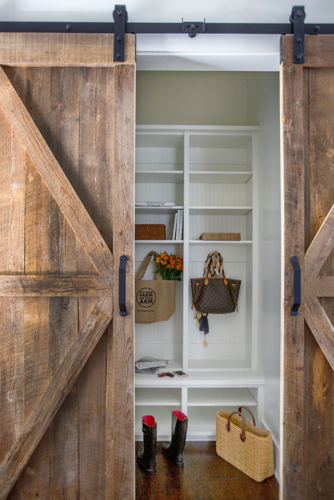 Inspiration for a mid-sized cottage dark wood floor mudroom remodel in Jacksonville