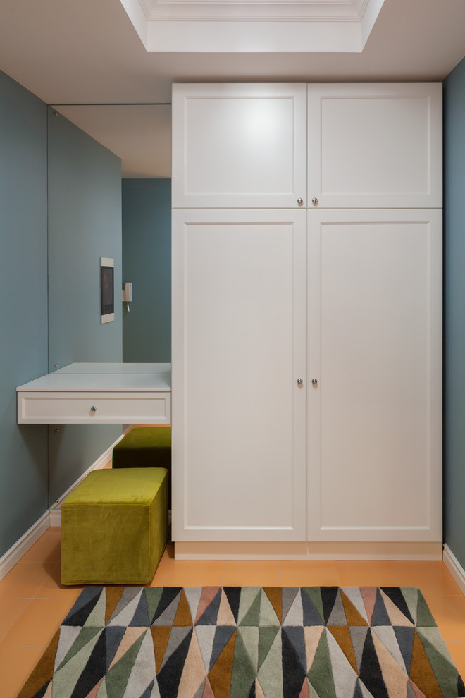 Источник вдохновения для домашнего уюта: входная дверь среднего размера в современном стиле с синими стенами и полом из керамической плитки